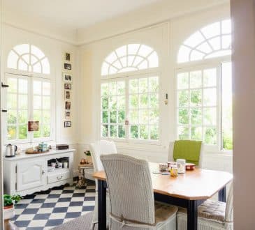 brown wooden table with chairs