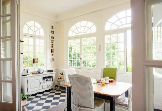 brown wooden table with chairs