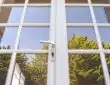 white metal framed glass window